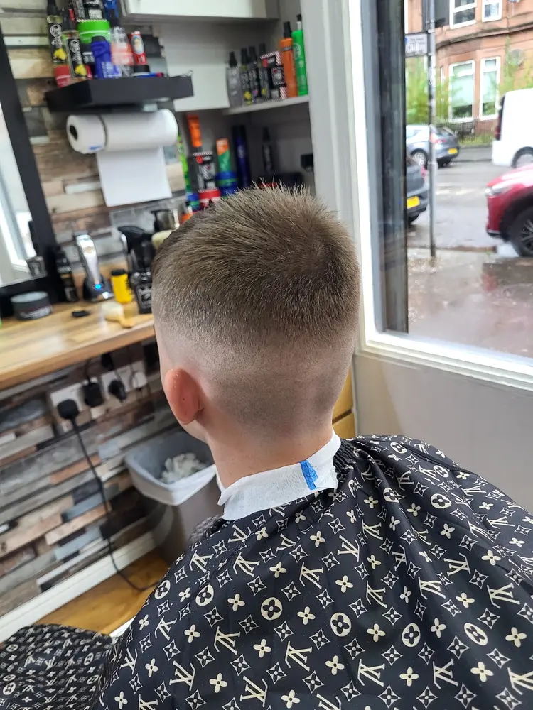 Finished skin fade haircut, back of head